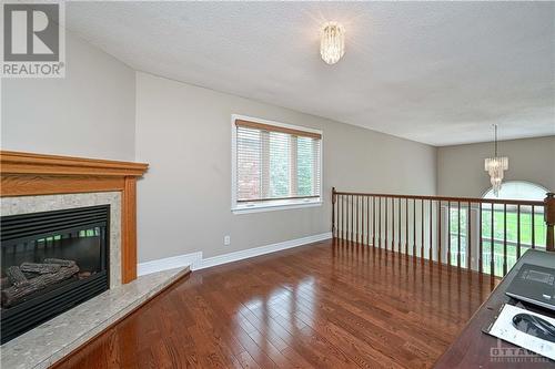 Primary Loft - 38 Knudson Drive, Ottawa, ON - Indoor With Fireplace