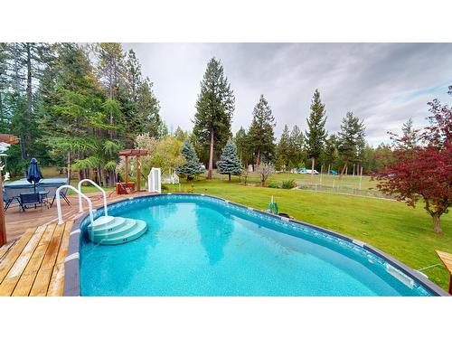 4144 29Th Street S, Cranbrook, BC - Outdoor With Above Ground Pool With Backyard