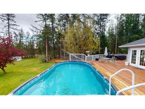 4144 29Th Street S, Cranbrook, BC - Outdoor With Above Ground Pool With Backyard