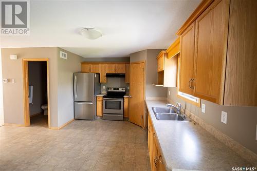 300 Mount Royal Place, Regina, SK - Indoor Photo Showing Kitchen With Double Sink