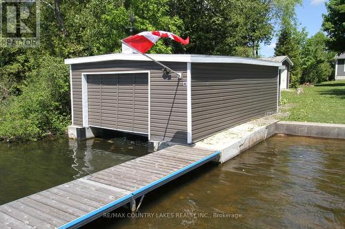 275 Mcguire Beach Road, Kawartha Lakes, ON - Outdoor With Body Of Water With Exterior