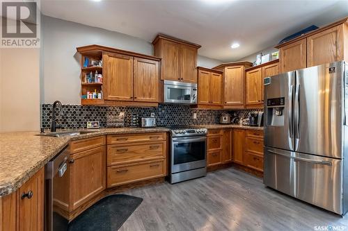 1164 3Rd Avenue Nw, Moose Jaw, SK - Indoor Photo Showing Kitchen With Double Sink