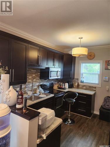1437 Wascana Street, Regina, SK - Indoor Photo Showing Kitchen With Double Sink