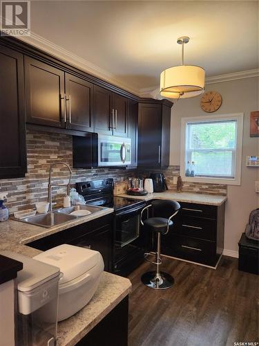 1437 Wascana Street, Regina, SK - Indoor Photo Showing Kitchen With Double Sink