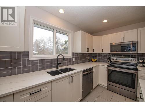 3054 Dunsmuir Road, Vernon, BC - Indoor Photo Showing Kitchen With Stainless Steel Kitchen With Double Sink