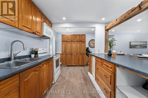 11 Edgewood Drive, Kawartha Lakes, ON - Indoor Photo Showing Kitchen With Double Sink