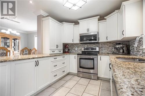 63 Heron Drive, Pembroke, ON - Indoor Photo Showing Kitchen With Double Sink