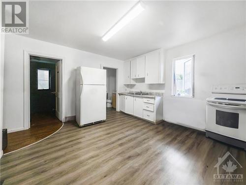 Virtually staged - 43 Government Road E, Kirkland Lake, ON - Indoor Photo Showing Kitchen