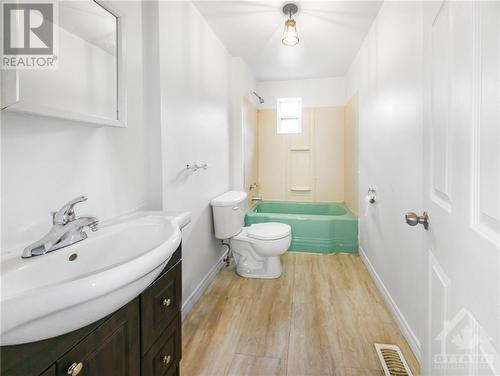 Virtually staged - 43 Government Road E, Kirkland Lake, ON - Indoor Photo Showing Bathroom