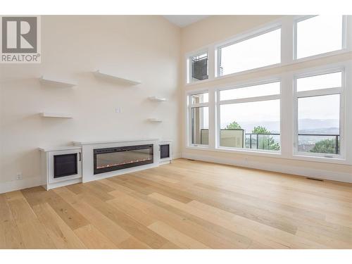 1125 Lone Pine Drive, Kelowna, BC - Indoor With Fireplace