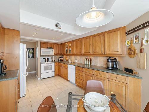 1605-55 Kingsbridge Garden Circ, Mississauga, ON - Indoor Photo Showing Kitchen With Double Sink