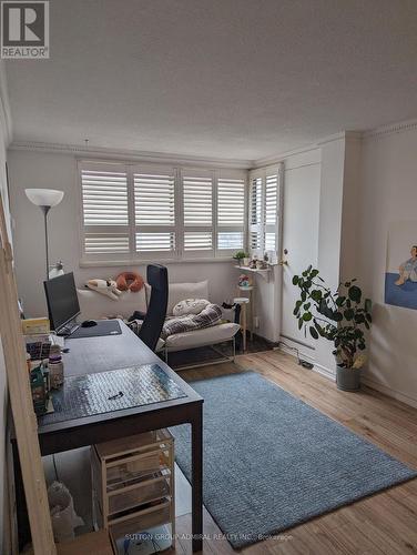 702 - 105 Mccaul Street, Toronto, ON - Indoor Photo Showing Living Room