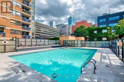 702 - 105 Mccaul Street, Toronto, ON - Outdoor With In Ground Pool