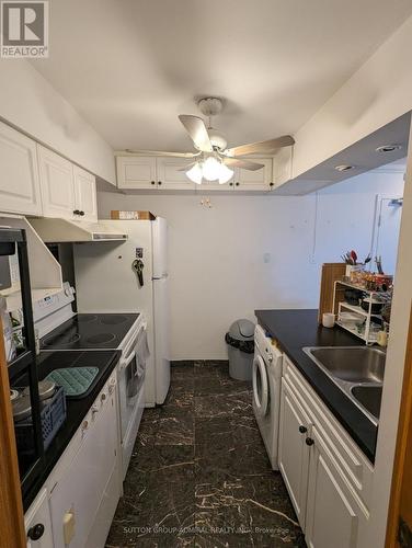 702 - 105 Mccaul Street, Toronto, ON - Indoor Photo Showing Kitchen With Double Sink