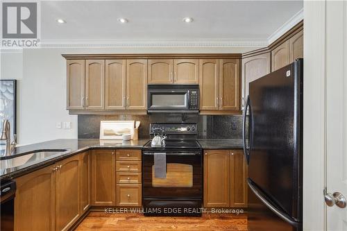 408 - 1998 Ironstone Drive, Burlington, ON - Indoor Photo Showing Kitchen