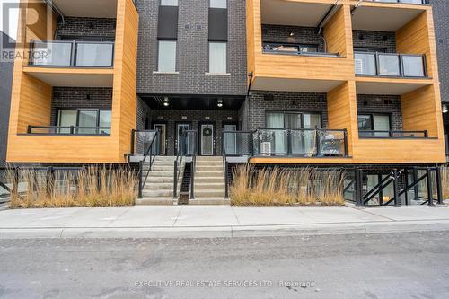 226 - 1145 Journeyman Lane, Mississauga, ON - Outdoor With Balcony With Facade