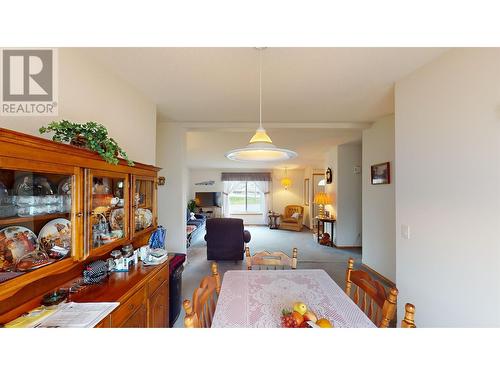 2299 Ash Avenue, Quesnel, BC - Indoor Photo Showing Living Room With Fireplace