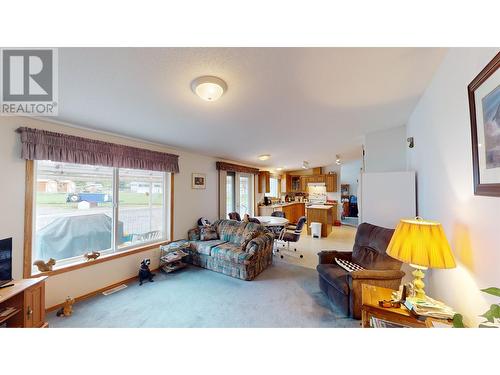 2299 Ash Avenue, Quesnel, BC - Indoor Photo Showing Other Room With Fireplace