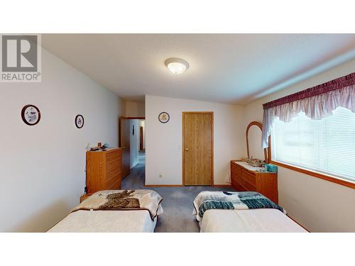 2299 Ash Avenue, Quesnel, BC - Indoor Photo Showing Bedroom