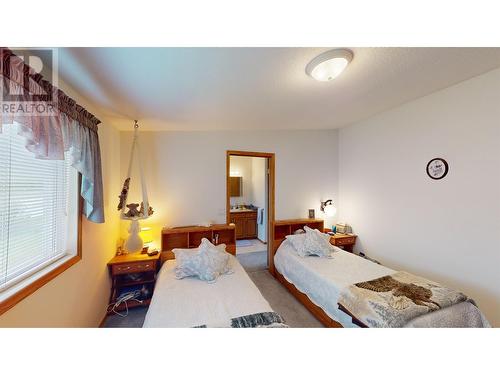 2299 Ash Avenue, Quesnel, BC - Indoor Photo Showing Bedroom