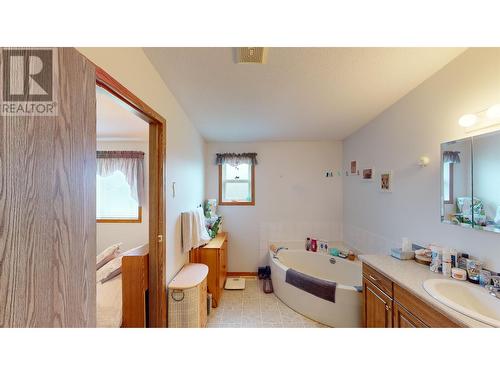 2299 Ash Avenue, Quesnel, BC - Indoor Photo Showing Bedroom