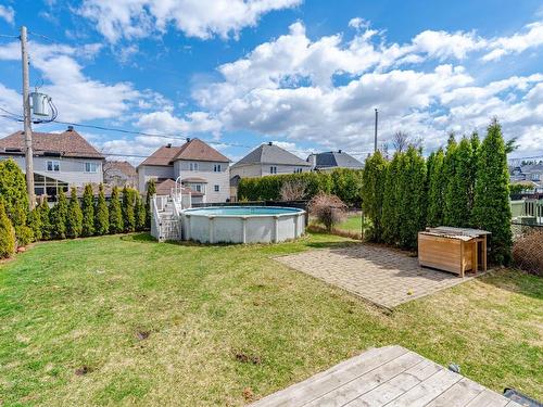 Cour - 3002 Rue Alphonse-De Lamartine, Laval (Chomedey), QC - Outdoor With Above Ground Pool With Backyard