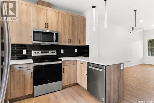 7664 Mapleford Boulevard, Regina, SK - Indoor Photo Showing Kitchen With Stainless Steel Kitchen