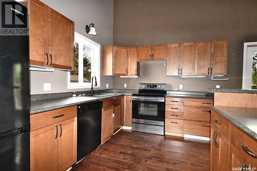 232 23Rd Street W, Prince Albert, SK - Indoor Photo Showing Kitchen With Double Sink