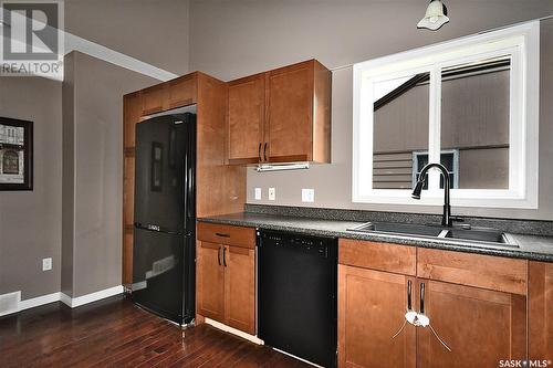 232 23Rd Street W, Prince Albert, SK - Indoor Photo Showing Kitchen With Double Sink