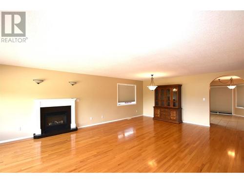 649 Elk Street, Vernon, BC - Indoor Photo Showing Living Room With Fireplace