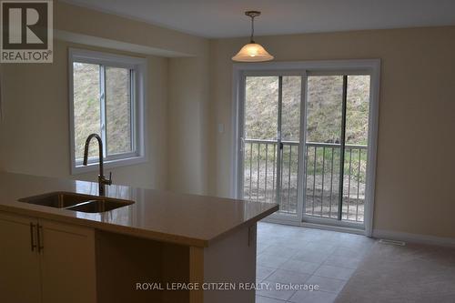 13 Revol Road, Penetanguishene, ON - Indoor Photo Showing Kitchen With Double Sink