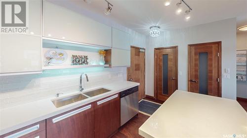 407 2101 Heseltine Road, Regina, SK - Indoor Photo Showing Kitchen With Double Sink