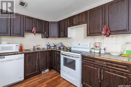 103 T Avenue N, Saskatoon, SK - Indoor Photo Showing Kitchen With Double Sink