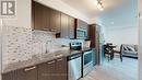 204 - 2150 Lawrence Avenue E, Toronto, ON  - Indoor Photo Showing Kitchen With Upgraded Kitchen 