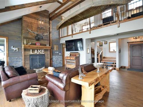 21 Blue Bay Lane, Kawartha Lakes, ON - Indoor Photo Showing Living Room With Fireplace