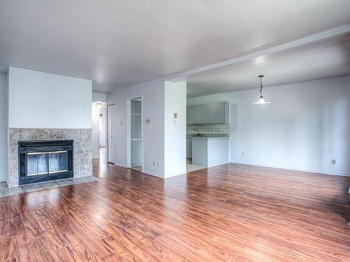 Salon - 5-43 Prom. Des Îles, Laval (Chomedey), QC - Indoor Photo Showing Living Room With Fireplace