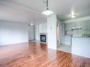 Salon - 5-43 Prom. Des Îles, Laval (Chomedey), QC  - Indoor Photo Showing Kitchen With Fireplace 