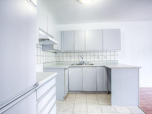 Kitchen - 5-43 Prom. Des Îles, Laval (Chomedey), QC - Indoor Photo Showing Kitchen With Double Sink