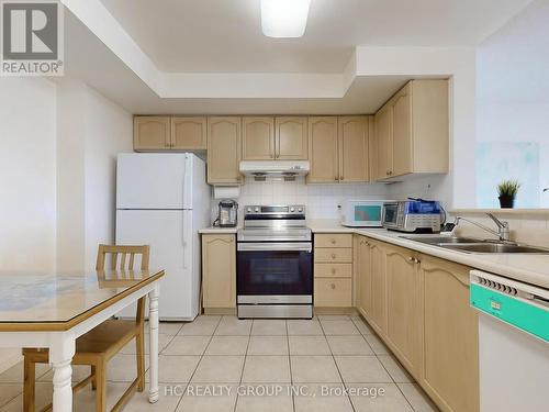 728 - 1881 Mcnicoll Avenue, Toronto E05, ON - Indoor Photo Showing Kitchen With Double Sink