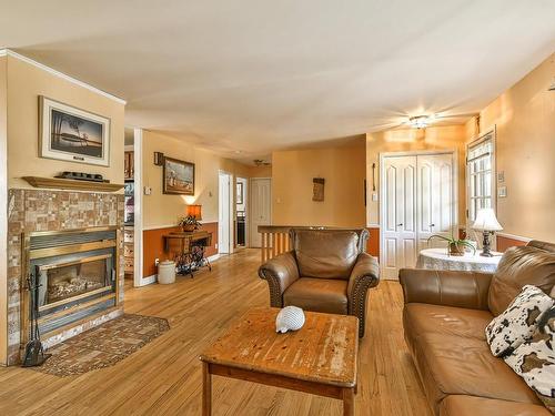 Living room - 101 Rue Nicole, Saint-Jérôme, QC - Indoor Photo Showing Living Room With Fireplace