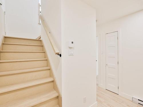 Staircase - 1980 Ch. Des Hauteurs, Saint-Hippolyte, QC - Indoor Photo Showing Other Room