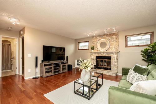 54 Hawstead Road, Winnipeg, MB - Indoor Photo Showing Living Room With Fireplace
