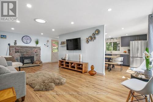 26 Manitou Lane, Kawartha Lakes, ON - Indoor Photo Showing Living Room With Fireplace