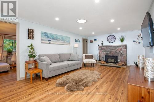 26 Manitou Lane, Kawartha Lakes, ON - Indoor Photo Showing Living Room With Fireplace