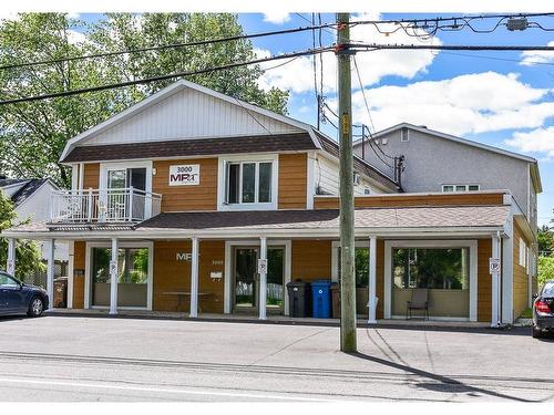 FaÃ§ade - 3000 Ch. Ste-Thérèse, Carignan, QC - Outdoor With Deck Patio Veranda With Facade