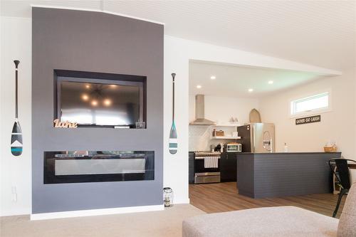 9-800 Idabel Lake Road, Naramata, BC - Indoor Photo Showing Living Room With Fireplace