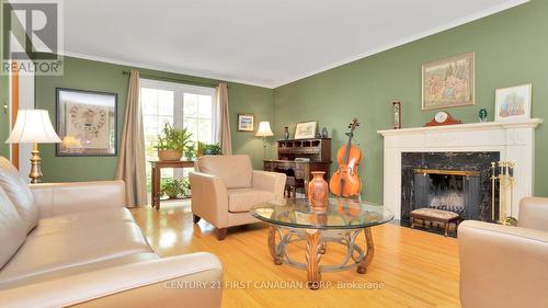 1370 Corley Drive, London, ON - Indoor Photo Showing Living Room With Fireplace