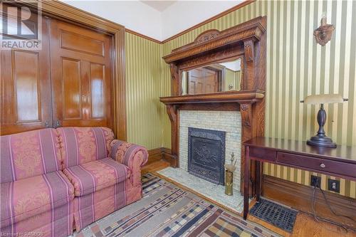 Original wood fireplace mantel - 167 10Th Street W, Owen Sound, ON - Indoor With Fireplace