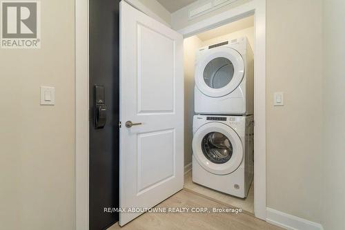 308 - 3200 William Coltson Avenue, Oakville, ON - Indoor Photo Showing Laundry Room