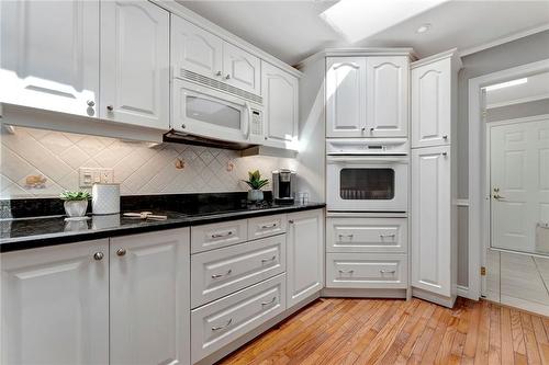 Ample storage space, all cupboards include pullout drawers - 40 Dunrobin Drive, Caledonia, ON - Indoor Photo Showing Kitchen